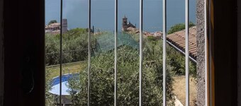 LOVELY APARTMENT IN AN ANCIENT HAMLET WITH LAKE VIEW AND PATIO