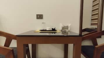 Superior Triple Room, City View | In-room dining
