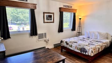 1 bedroom, desk, iron/ironing board, travel crib