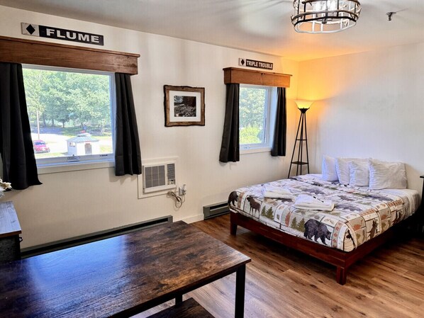 1 bedroom, desk, iron/ironing board, travel crib