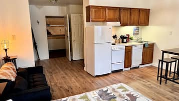 1 bedroom, desk, iron/ironing board, travel crib