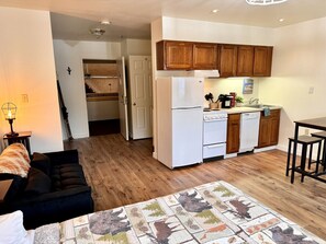 1 bedroom, desk, iron/ironing board, travel crib