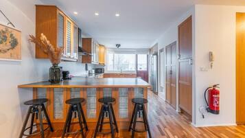 Panoramic Penthouse | Private kitchen | Fridge, microwave, oven, stovetop