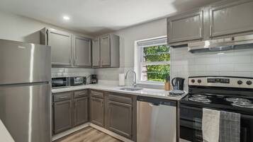 Coffee/tea maker, fridge, oven, stovetop