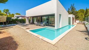 A modern house with a swimming pool, outdoor seating, and a patio area. - V. Ca Na Rosa With Private Pool (Mal Pas - Bon Aire)