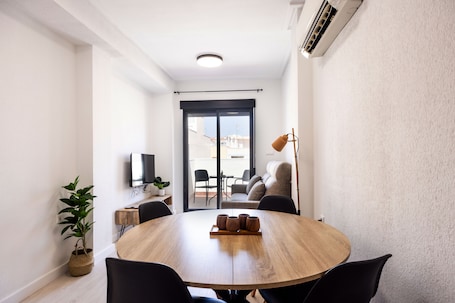 Superior Apartment | Living area | Flat-screen TV