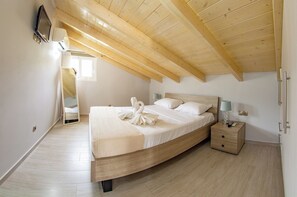 2 عدّة غرف نوم ومكواة/لوح كي وواي فاي وملاءات أسرّة