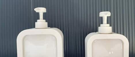 Hair dryer, towels, soap, toilet paper