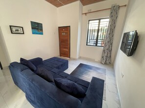 TV - Wayimbila Apartments (Lusaka)