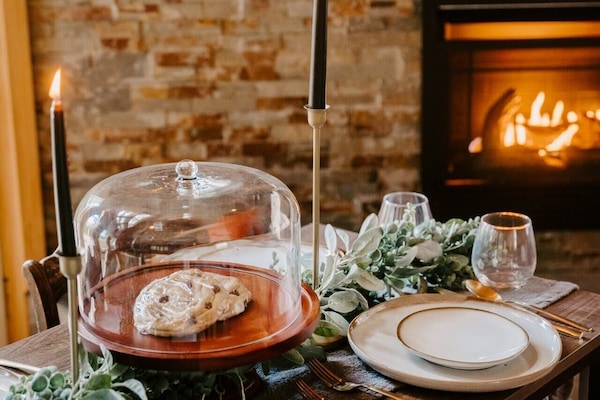 Evenings at SkyView Treehouse are meant to be savored — candlelit dinners, crackling fires, and sweet moments shared.