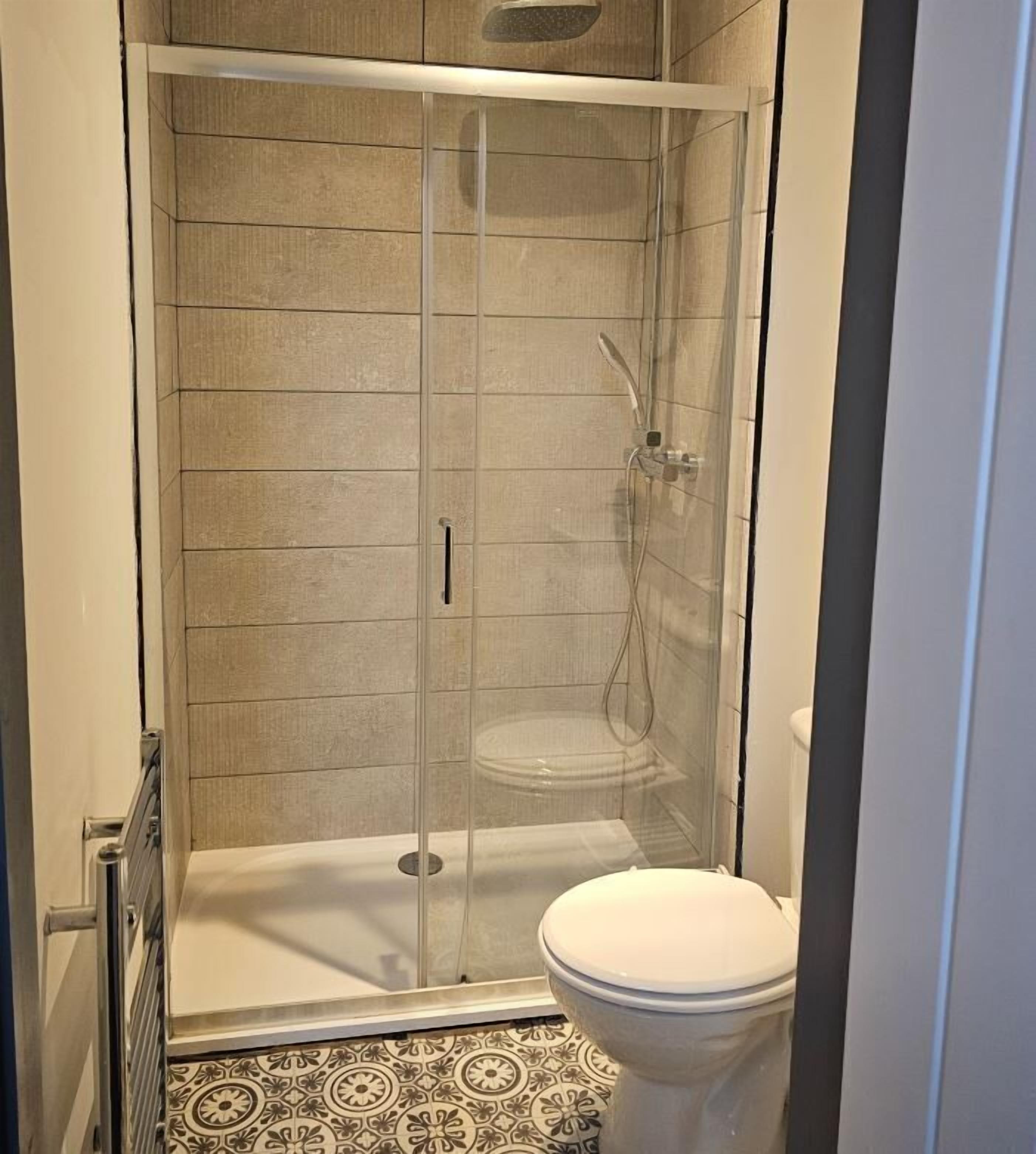 Shower, towels, soap, shampoo