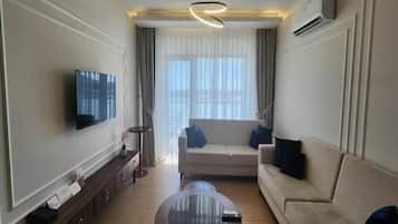 Deluxe Suite, Balcony, Sea View | Living area