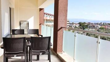 Deluxe Suite, Balcony, Sea View | Terrace/patio