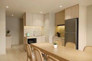 Suite, 3 Bedrooms, Balcony, Pool View | Private kitchen | Full-size fridge, espresso maker, coffee/tea maker, electric kettle