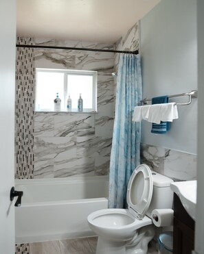 Hair dryer, towels, soap, shampoo