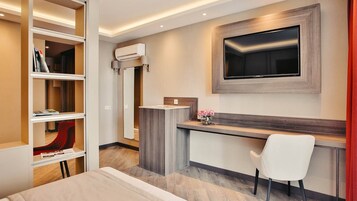 Classic Studio, Balcony | Living area | TV