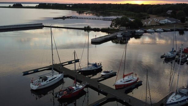 A marina with several boats docked at the pier. - Holiday Home in Stepniczka (Stepnica)