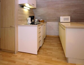 Apartamento | Cocina privada | Trona infantil