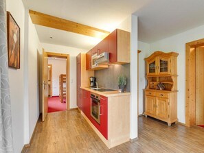 Apartamento | Cozinha privada | Torradeira, cadeirão de bebê