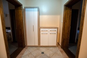 A hallway with a wardrobe and a small cabinet. - Villa in Starigrad Near Paklenica National Park (Starigrad)