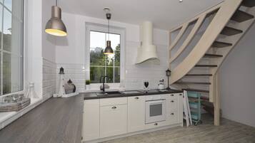 Villa | Private kitchen | Electric kettle, toaster, high chair