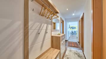 Classic Apartment, 2 Bedrooms, Ground Floor | Living area | 50-inch flat-screen TV with cable channels, heated floors
