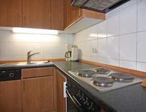 Appartement | Cuisine privée | Chaise haute