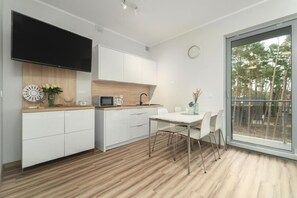 Apartment | Private kitchen | High chair - Holiday Studio Very Close to the Seaside Beach (Rewal)