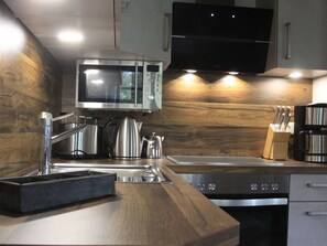 House | Private kitchen | Electric kettle, toaster, high chair - Doppelhaushalfte Dunenhaus I, Trassenheide (Trassenheide)