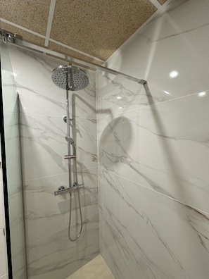 Hair dryer, towels, soap, shampoo