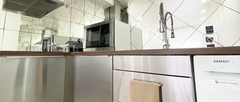 Fridge, microwave, stovetop, coffee/tea maker