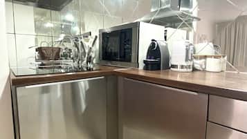 Fridge, microwave, stovetop, coffee/tea maker