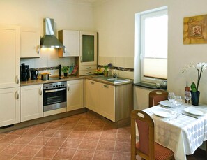 Apartamento | Cocina privada | Trona infantil