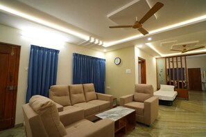Appartamento Deluxe, balcone | Area soggiorno