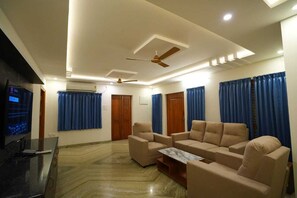 Deluxe Apartment, Balcony | Living area