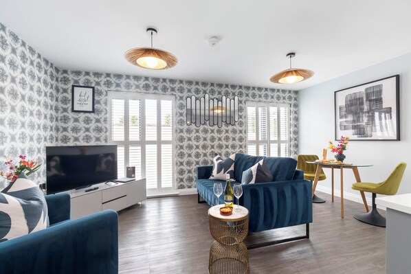 Apartment | Living area | 50-inch Smart TV with cable channels, Netflix, streaming services