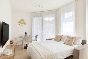 1 bedroom, desk, iron/ironing board, travel crib