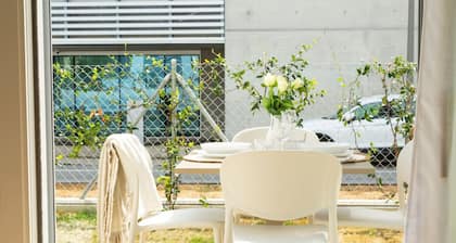 Charming new Apt with AC, private garden & garage