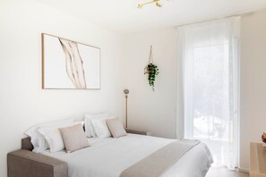 1 bedroom, desk, iron/ironing board, travel crib