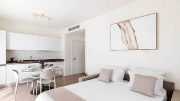 1 bedroom, desk, iron/ironing board, travel crib