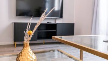 Luxury Suite | Living area | Smart TV