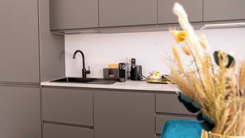 Luxury Suite | Private kitchen | Full-sized fridge, oven, stovetop, espresso maker