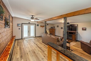 Smart TV, fireplace, books