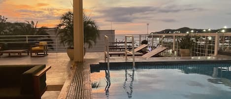 Outdoor pool, sun loungers