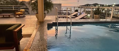 Outdoor pool, sun loungers