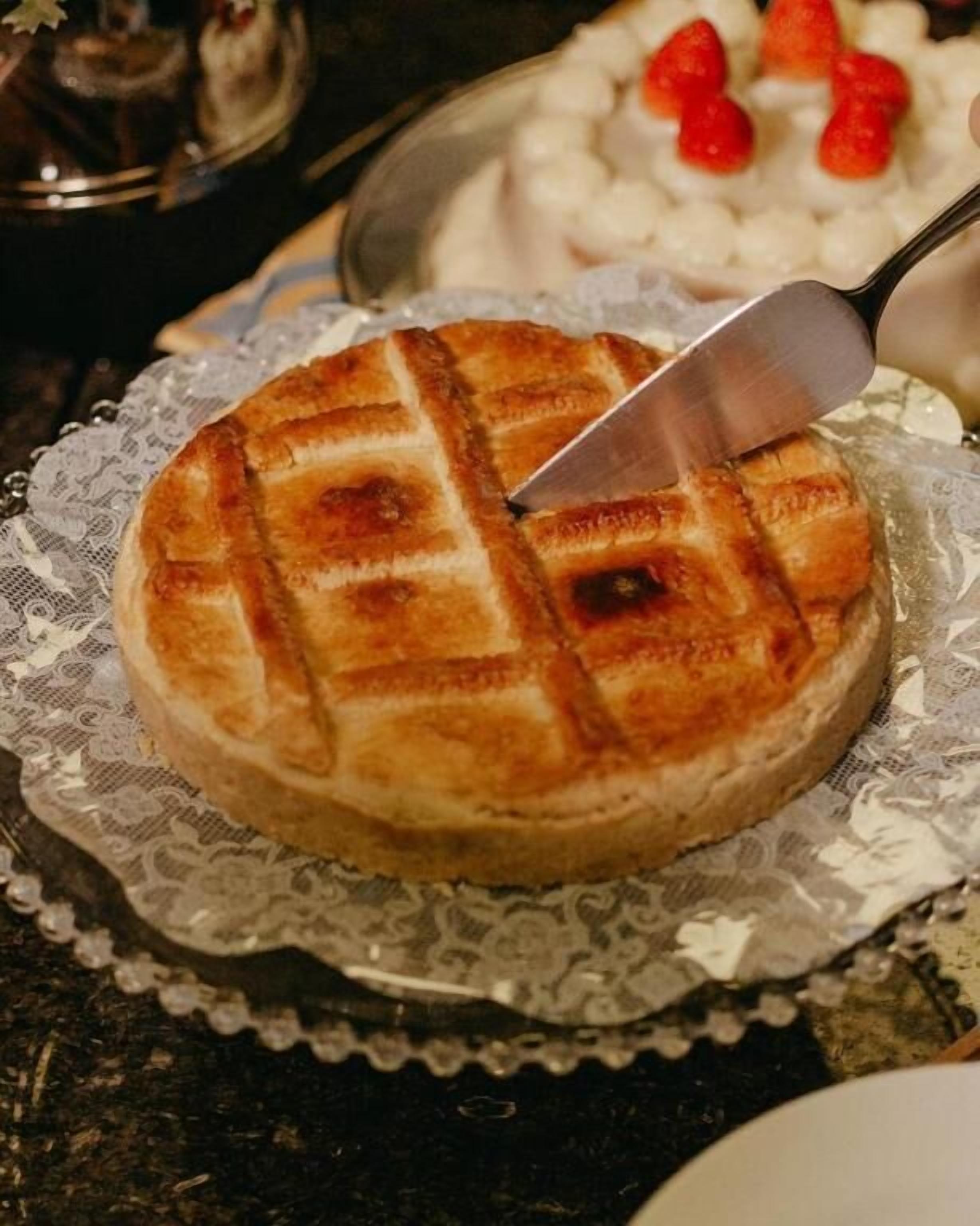 A waffle with a waffle iron imprint on a plate.