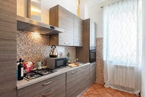 Apartment | Private kitchen | Fridge, microwave, oven, stovetop