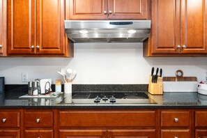 Fridge, dishwasher, cookware/dishes/utensils