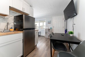 Fridge, microwave, stovetop, coffee/tea maker