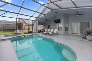 Outdoor pool, a heated pool - Escape to Elegance: 3BR 3BA Heated Pool Villa (Davenport)